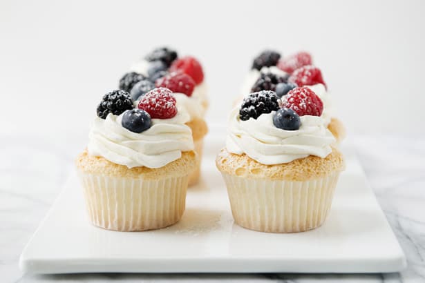 Angel Food Cupcakes with Whipped Cream and Berries ...