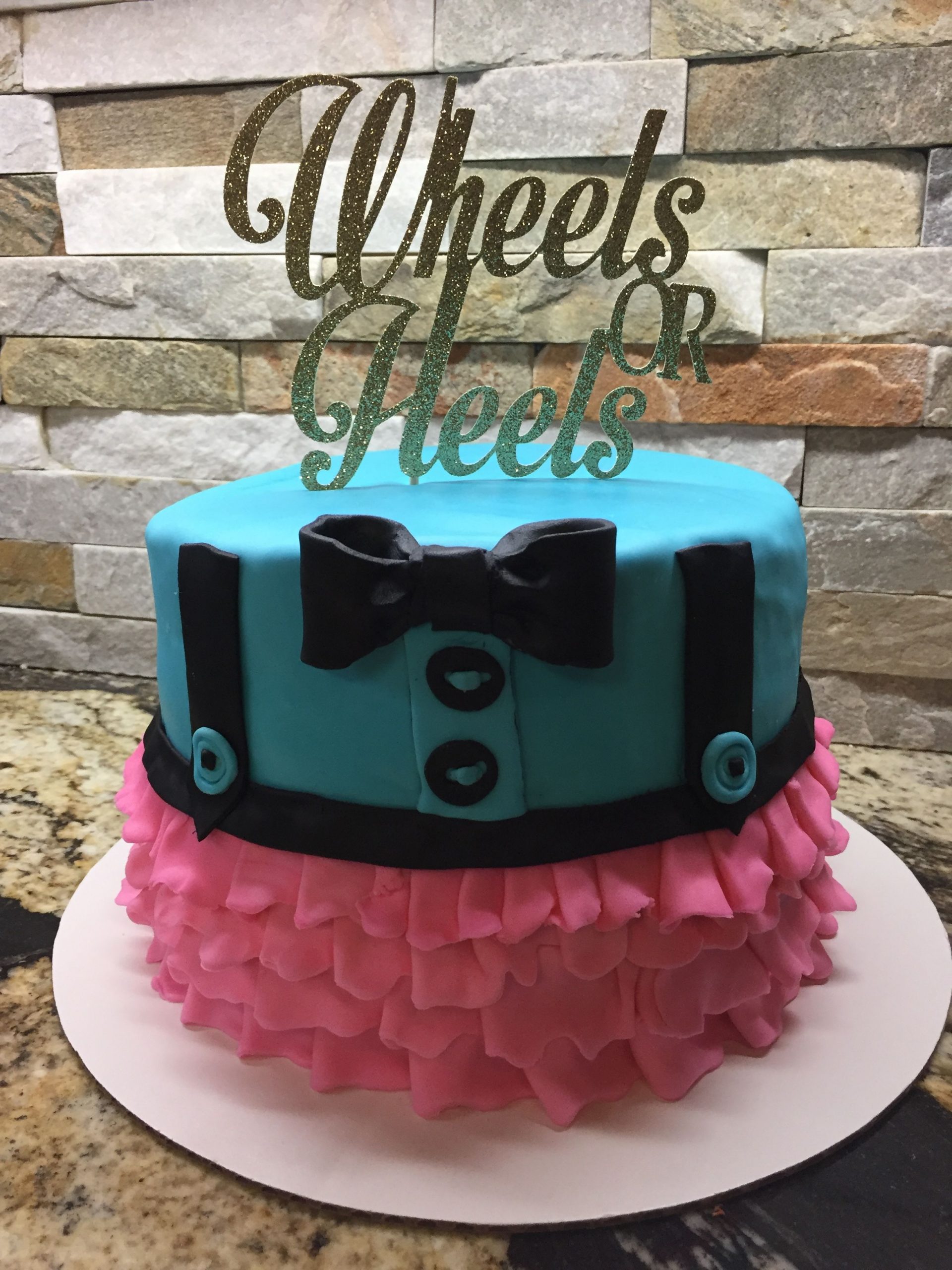 Gender reveal cake wheels or heels