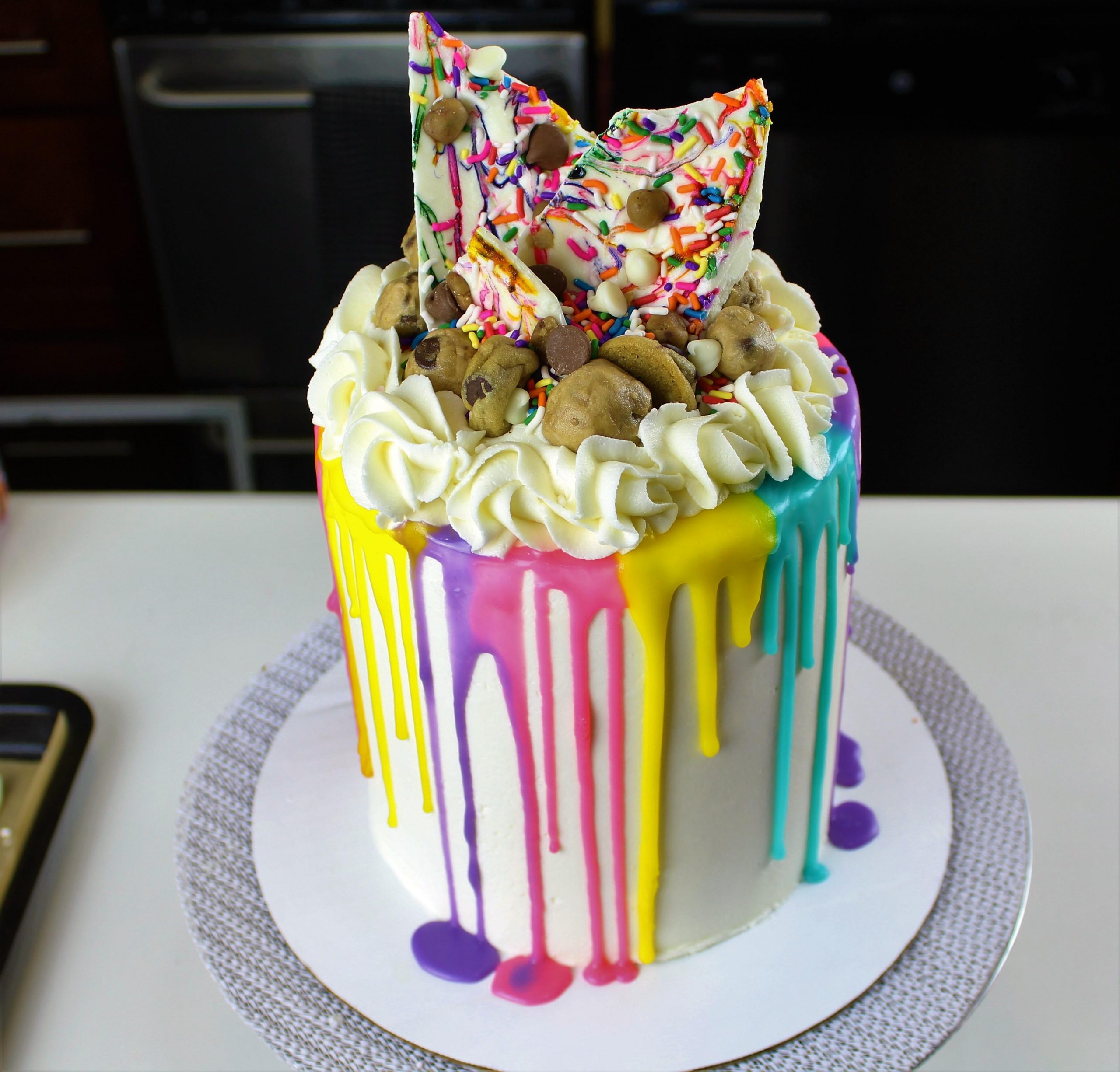 Learn how to decorate an Easy Colorful Drip Cake with Edible Cookie ...