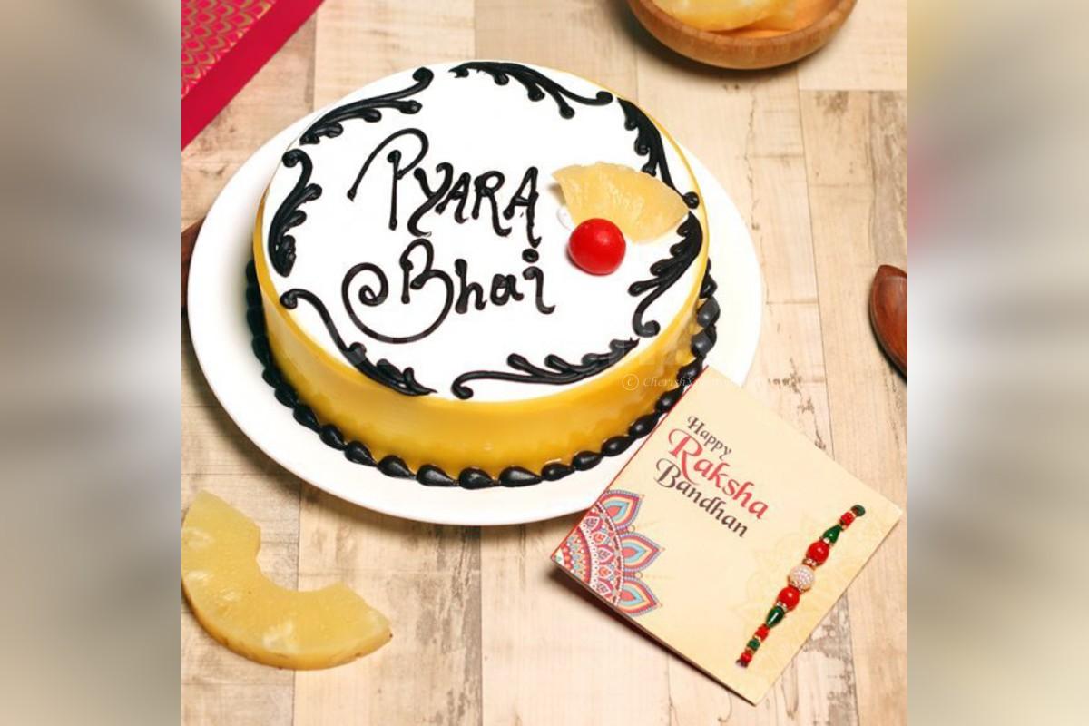 Order Rakhi &  Pineapple Punch Cake Online Free Shipping in ...