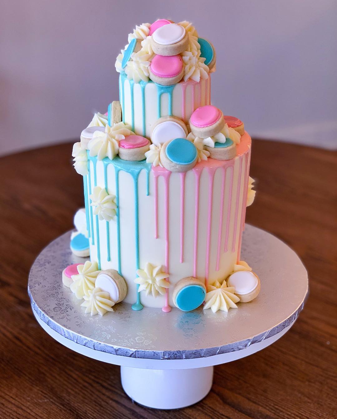 Pink and blue drip gender reveal cake