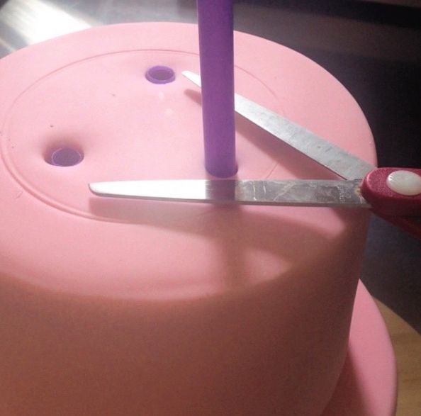 Use bubble tea straws to prevent your cakes from sliding.